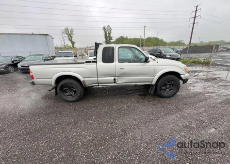 2002 Toyota Tacoma from USA, damaged, VIN 5TEWM72N02Z106497